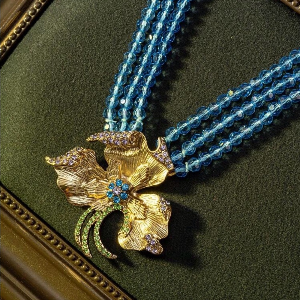 Elegant Gold and Blue Floral Necklace